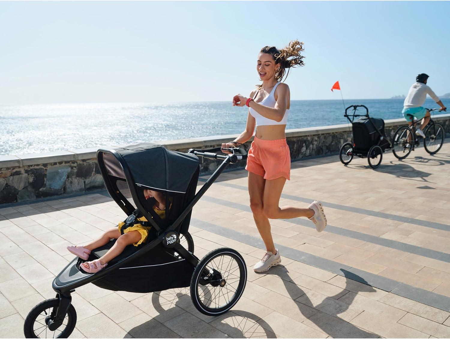 imageBaby Jogger Bike Trailer Compatible with City Prix Jogging Stroller AllWheel Suspension ampamp FrontWheel Swivel for Smooth Rides Seatback and UnderSeat Storage and Mesh CoveringJogger Bike Trailer